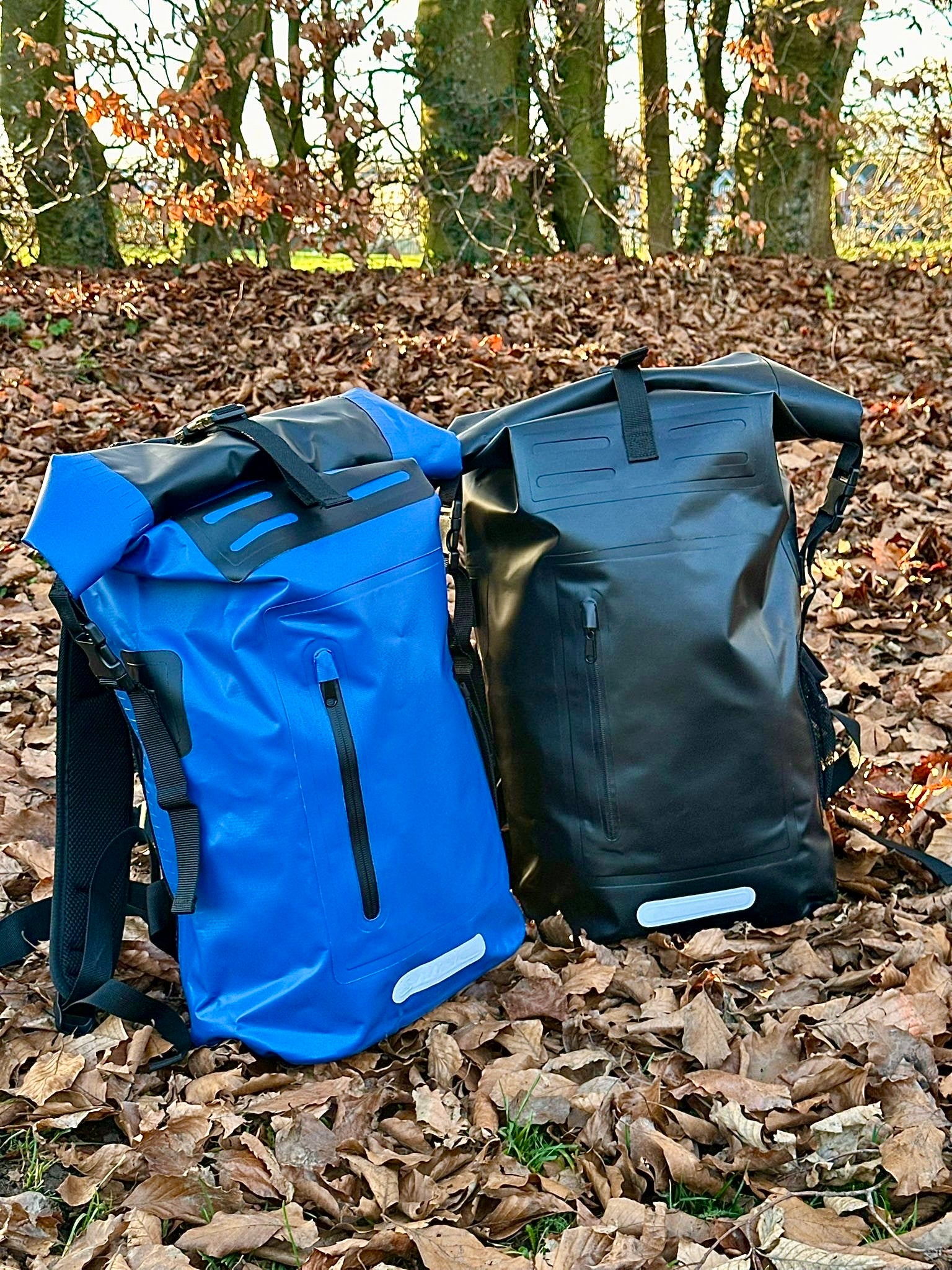 Black 35L waterproof roll top dry bag backpack for swimming and beach and everyday use 