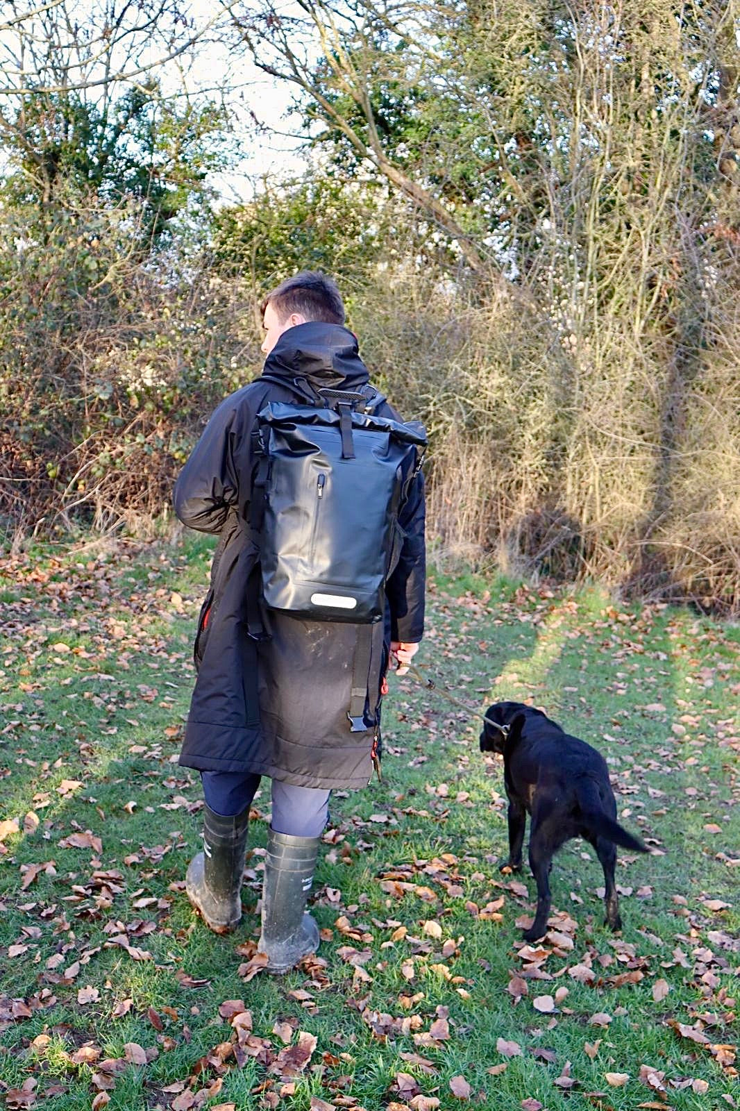 Black 35L waterproof roll top dry bag backpack for swimming and beach and everyday use 