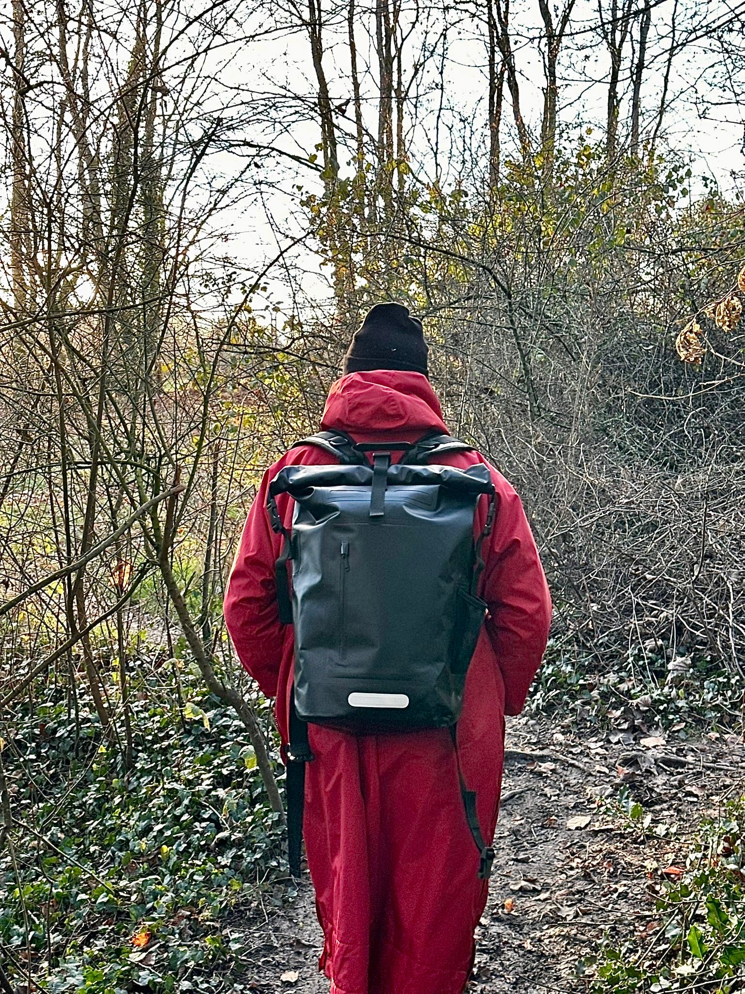 Black 35L waterproof roll top dry bag backpack for swimming and beach and everyday use 